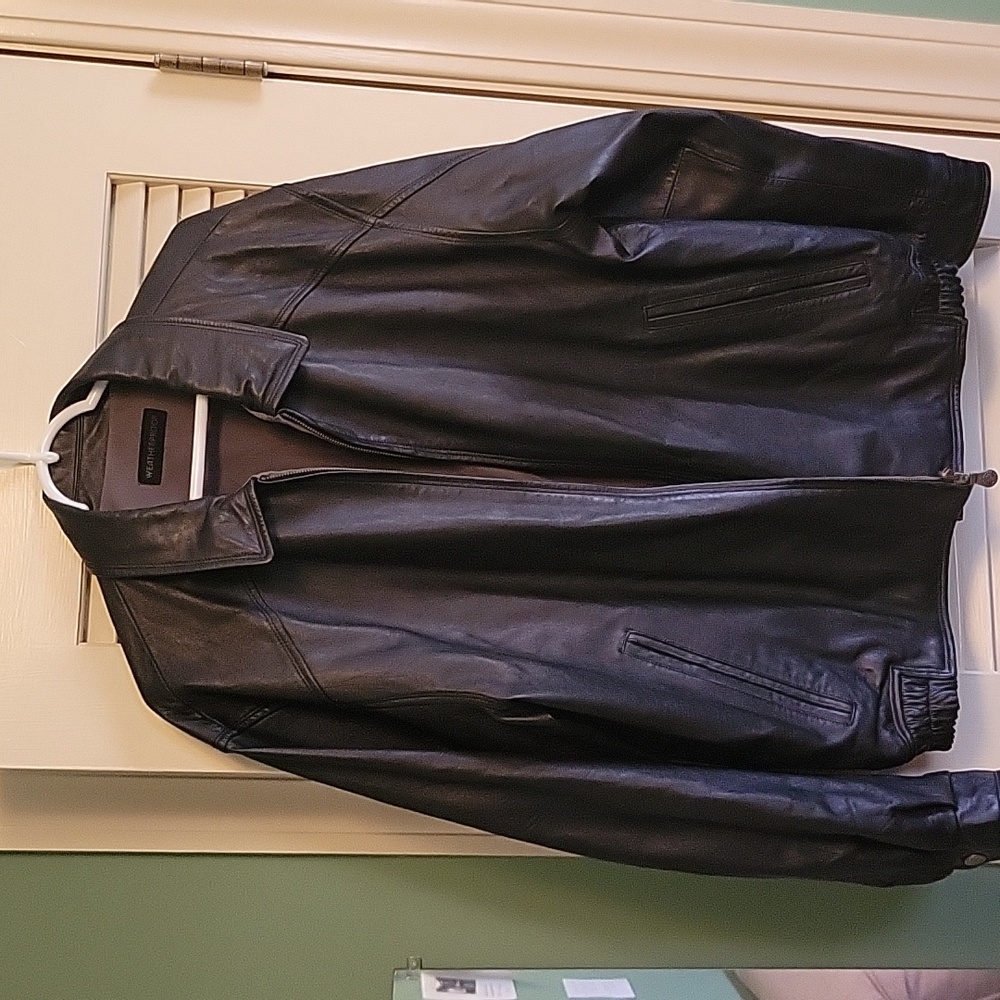 Weatherproof zip front black Leather coat.